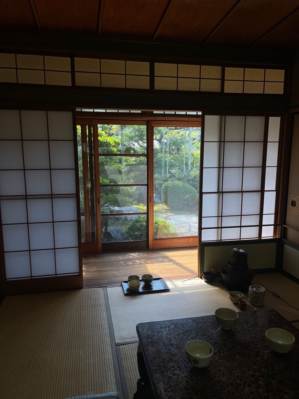 Quiet Kyoto wooden courtyard and bamboo basin